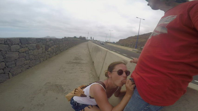 Giving him a public blowjob in the highway [GIF]
