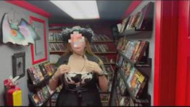 Perverse cowgirl gone wild in a video store [gif]