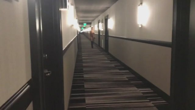 Naked in the hotel hallway