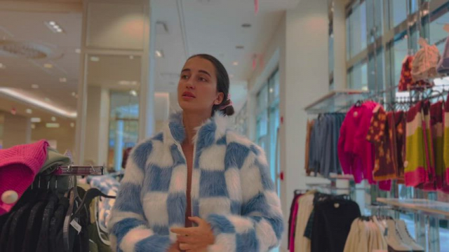 Without a bra in the store [gif]