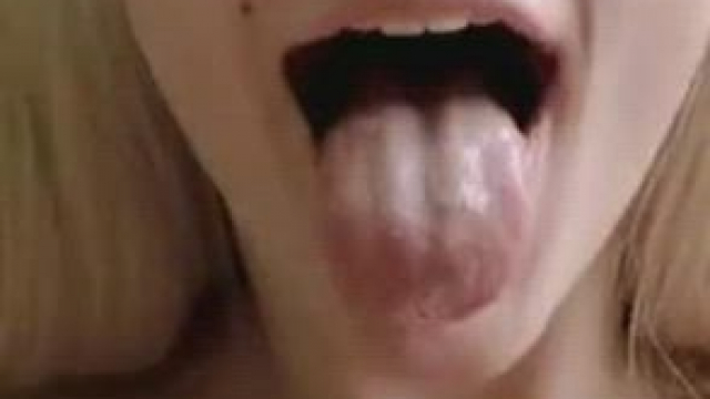 Cute blonde gets big cumload on tongue