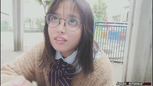 Amateur Japanese Girl With Glasses Deepthroating A Cock In A Park
