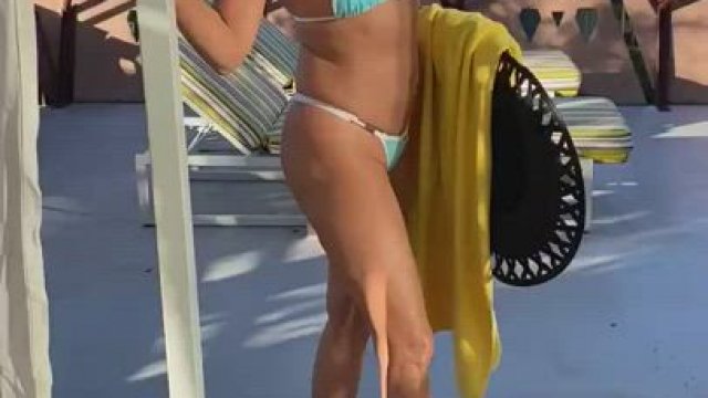 showing off her new skimpy bikini