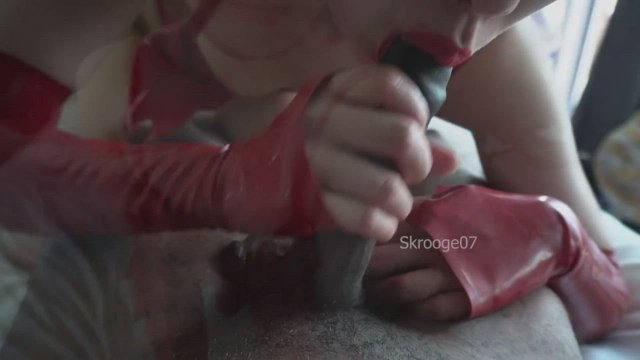 Asian gives bj in red latex