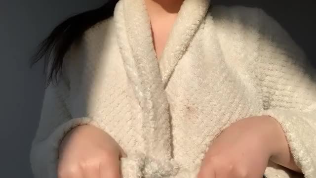 Revealing my big tits under my robe... 