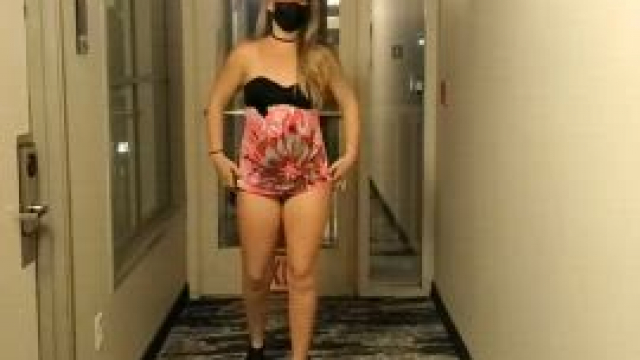 Stripping in the Hotel Hallway