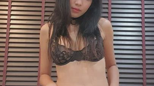 Beautiful Asian chick showing off her body