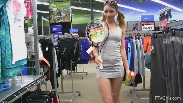 Blonde tries to masturbate with a tennis racket