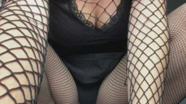 I love how my big tits looks like being squeezed by a fishnet