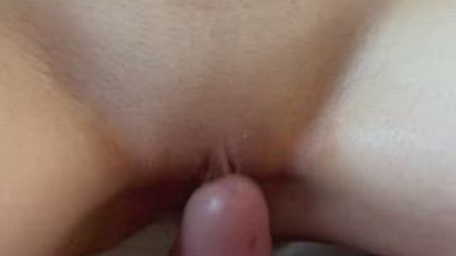 Playing with her clit before sliding in