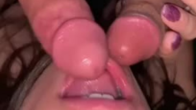 One girl sucking two dicks