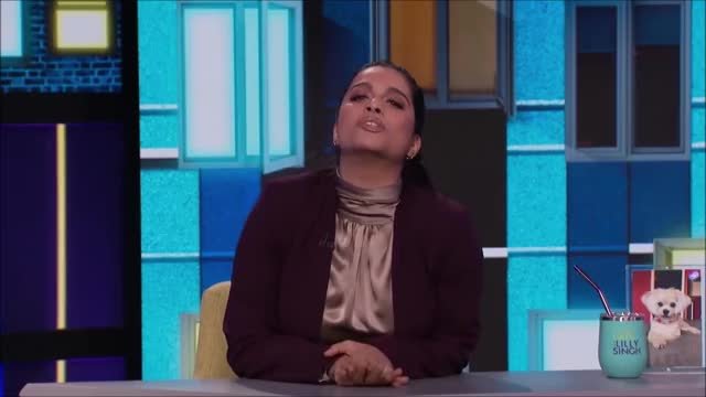 Lilly Singh in a satin blouse